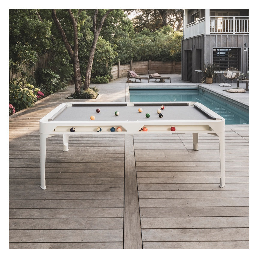 Cornilleau HYPHEN Outdoor Pool Table - White Frame / Light Grey Cloth - Outside by the swimming pool